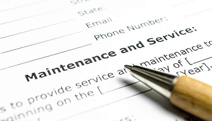 Close-up of a contract document with a pen, representing open solicitations.